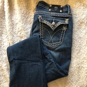 Medium wash Miss Me embroidered jeans